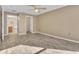 Large main bedroom featuring vinyl floors, neutral walls, and a ceiling fan at 1877 N Merrick Dr # 0, Deltona, FL 32738