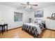 Well-lit bedroom with hardwood floors and ample natural light at 1880 N Merrick Dr, Deltona, FL 32738