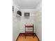 A walk-in closet featuring custom white wire shelving and a wooden valet stand at 1880 N Merrick Dr, Deltona, FL 32738