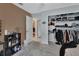 Bedroom featuring open closet with shelves and racks, providing ample storage space at 1963 Stacey Cir, Deltona, FL 32738