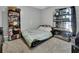 This bedroom features multiple fish tanks and bookshelves filled with books and collectibles at 1963 Stacey Cir, Deltona, FL 32738