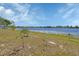Expansive lake view showcasing the natural beauty of the waterfront property at 1963 Stacey Cir, Deltona, FL 32738