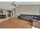 Open-concept living room with hardwood floors, view of the kitchen, and neutral walls at 1963 Stacey Cir, Deltona, FL 32738