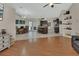 Spacious living room offering an open floor plan with kitchen and dining areas at 1963 Stacey Cir, Deltona, FL 32738