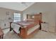Comfortable main bedroom with vaulted ceiling and a large window at 1963 Stacey Cir, Deltona, FL 32738