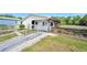 Exterior view of a boat house offering waterfront access and a wooden boardwalk at 24919 Drive No 1, Astor, FL 32102