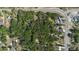 Aerial shot of a wooded lot in a well-connected area, highlighting its accessibility and location at 26 E Kelly Park Rd, Apopka, FL 32712
