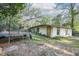 Charming exterior of a shed with durable siding, situated in a large yard and lots of privacy at 26 E Kelly Park Rd, Apopka, FL 32712