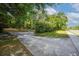 Paved driveway near an outdoor entrance, offering convenient access to the main road at 26 E Kelly Park Rd, Apopka, FL 32712