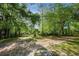 Beautiful lot with mature trees, a tranquil escape for your future home at 26 E Kelly Park Rd, Apopka, FL 32712