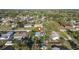 Aerial view showing the home, surrounding greenery and neighborhood at 3228 Unity Tree Dr, Edgewater, FL 32141