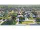 Aerial view of a neighborhood showcasing the home's location with nearby trees at 3228 Unity Tree Dr, Edgewater, FL 32141