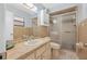 Well-lit bathroom featuring a shower, vanity, and a mirror, offering a clean and functional space at 3228 Unity Tree Dr, Edgewater, FL 32141