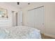 Bedroom featuring a comfortable bed with views to the walk-in closet at 3329 Bailey Ann Dr, Ormond Beach, FL 32174