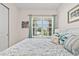 Bedroom featuring a comfortable bed with a view from the window at 3329 Bailey Ann Dr, Ormond Beach, FL 32174