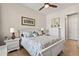 Comfortable bedroom with a queen bed, two nightstands, and a four drawer dresser at 3329 Bailey Ann Dr, Ormond Beach, FL 32174