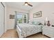 Cozy bedroom featuring natural light from the window, a comfortable bed, and tasteful decorations at 3329 Bailey Ann Dr, Ormond Beach, FL 32174