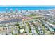 Residential neighborhood with houses, green spaces, swimming pools, and proximity to the ocean at 354 Georgetown Dr, Daytona Beach, FL 32118