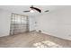 Large bedroom with light-colored hardwood floors, a ceiling fan, and lots of natural light at 354 Georgetown Dr, Daytona Beach, FL 32118