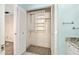 This closet has louvered doors and custom shelving at 354 Georgetown Dr, Daytona Beach, FL 32118
