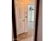 Hallway with tile floors and doorway into living room at 354 Georgetown Dr, Daytona Beach, FL 32118