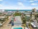 Aerial view featuring a building near the beach and ocean, close to local amenities at 3620 Cardinal Blvd # 80, Daytona Beach, FL 32118