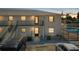 Bright multi-Gathering property featuring a swimming pool and well maintained grounds at sunset at 3620 Cardinal Blvd # 80, Daytona Beach, FL 32118