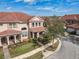 Aerial view of a townhome featuring a well-manicured lawn and mature trees at 3620 Tresto St, New Smyrna Beach, FL 32168