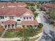 Aerial view of a townhome community highlighting the well-designed layout and landscaping at 3620 Tresto St, New Smyrna Beach, FL 32168