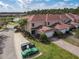 Charming townhome featuring an attached garage and lush landscaping at 3620 Tresto St, New Smyrna Beach, FL 32168