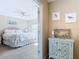 Inviting bedroom with a ceiling fan, a serene view, and neutral decor at 3620 Tresto St, New Smyrna Beach, FL 32168