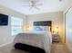 Comfortable main bedroom with a large bed and side tables at 3620 Tresto St, New Smyrna Beach, FL 32168