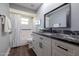 Bathroom with vanity, granite countertops and shower at 464 Nash Ln, Port Orange, FL 32127
