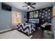 Stylish bedroom featuring a fun decor and comfortable furnishings at 464 Nash Ln, Port Orange, FL 32127