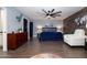 Spacious bedroom with a wooden accent wall and modern decor at 464 Nash Ln, Port Orange, FL 32127