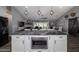 Spacious kitchen with island and microwave, opening up to living and dining areas at 464 Nash Ln, Port Orange, FL 32127