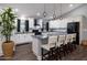 Beautiful kitchen features white cabinets, a large island, and stainless steel appliances at 464 Nash Ln, Port Orange, FL 32127