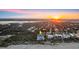 Aerial view of a beachfront home with a private beach access, lush trees, and scenic waterfront living at 4911 S Atlantic Ave, Ponce Inlet, FL 32127