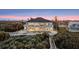 Backyard of a luxurious two-story house featuring a pool and beach access at 4911 S Atlantic Ave, Ponce Inlet, FL 32127