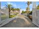 Gated entrance to a grand white mansion with manicured lawn and beautiful landscaping at 4911 S Atlantic Ave, Ponce Inlet, FL 32127