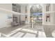 Grand foyer featuring high ceilings, elegant furnishings, and ample natural light at 4911 S Atlantic Ave, Ponce Inlet, FL 32127