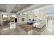 This luxurious living room features a fireplace, ocean views and modern design at 4911 S Atlantic Ave, Ponce Inlet, FL 32127