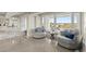 Bright sitting area boasts large windows with beautiful beach views at 4911 S Atlantic Ave, Ponce Inlet, FL 32127