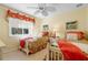 Inviting bedroom with twin beds, light yellow walls, and bright, cheerful decor at 509 Victoria Hills Dr, Deland, FL 32724