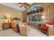 Bedroom featuring a large window, vaulted ceiling, a ceiling fan, and comfortable seating at 509 Victoria Hills Dr, Deland, FL 32724