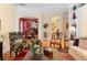 Inviting living room showcasing hardwood floors, archways, and tasteful furnishings at 509 Victoria Hills Dr, Deland, FL 32724