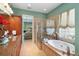 Relaxing main bathroom with a soaking tub, glass shower, and dual vanities at 509 Victoria Hills Dr, Deland, FL 32724