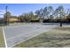 Outdoor tennis courts surrounded by trees and fencing at 509 Victoria Hills Dr, Deland, FL 32724