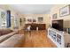 Comfortable living area featuring hardwood floors, stylish furniture, and ample natural light at 514 Land O Lakes Ct, Deland, FL 32724