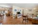 Inviting living room featuring hardwood floors and neutral decor, perfect for relaxation at 514 Land O Lakes Ct, Deland, FL 32724